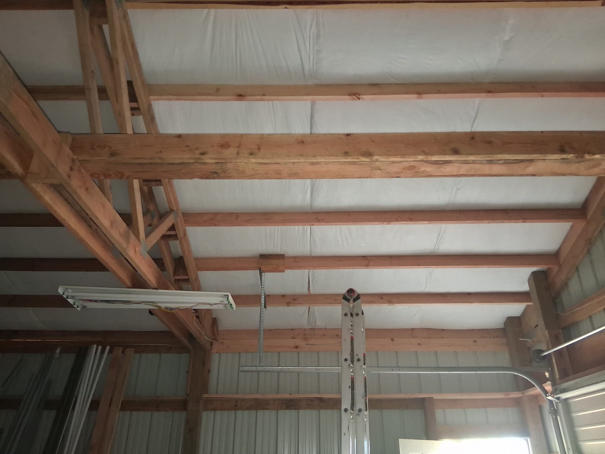 Garage roof insulation and framing after TK Construction repair
