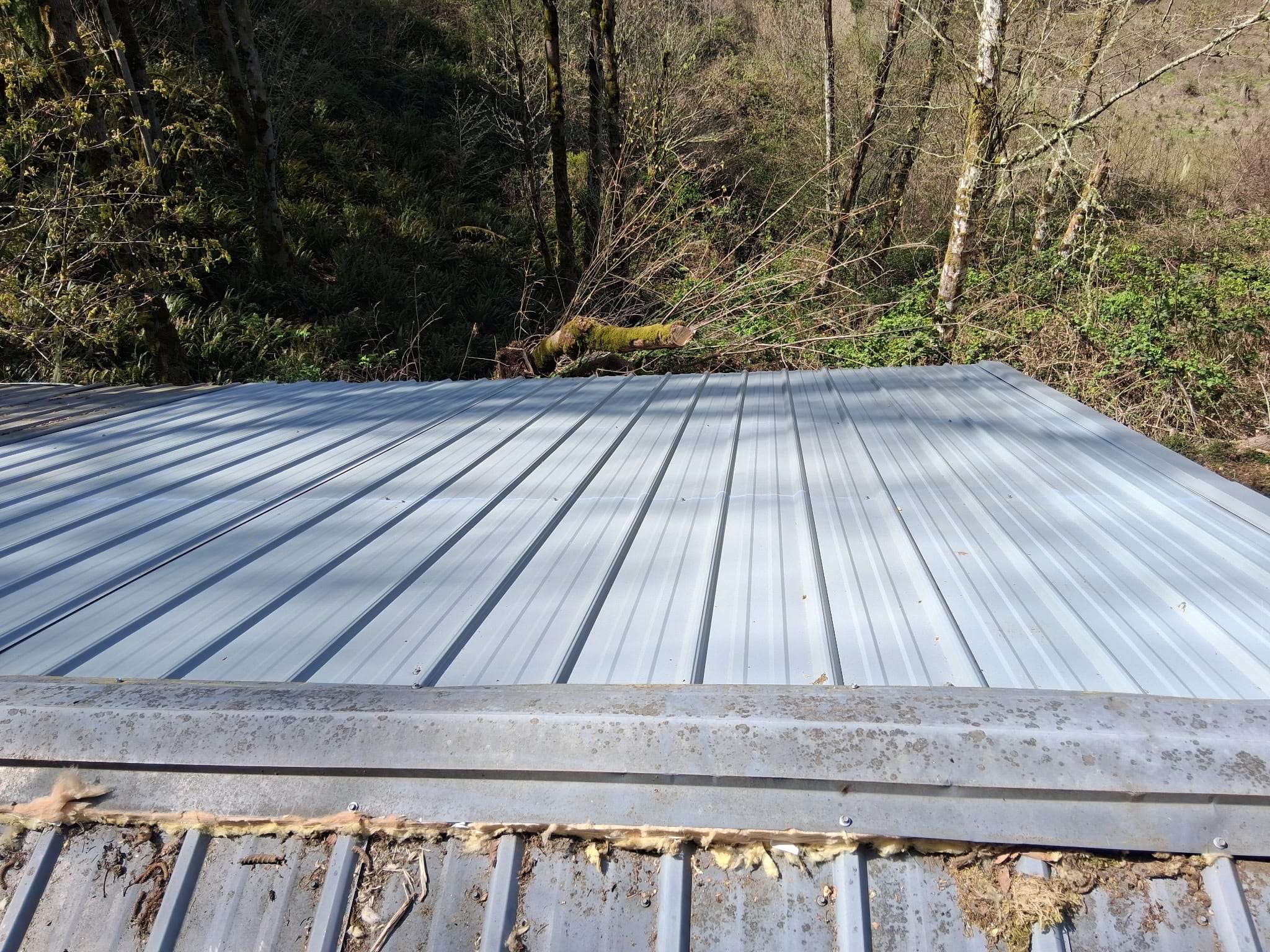 Metal roof panel installed during roofing work in Southwest Washington